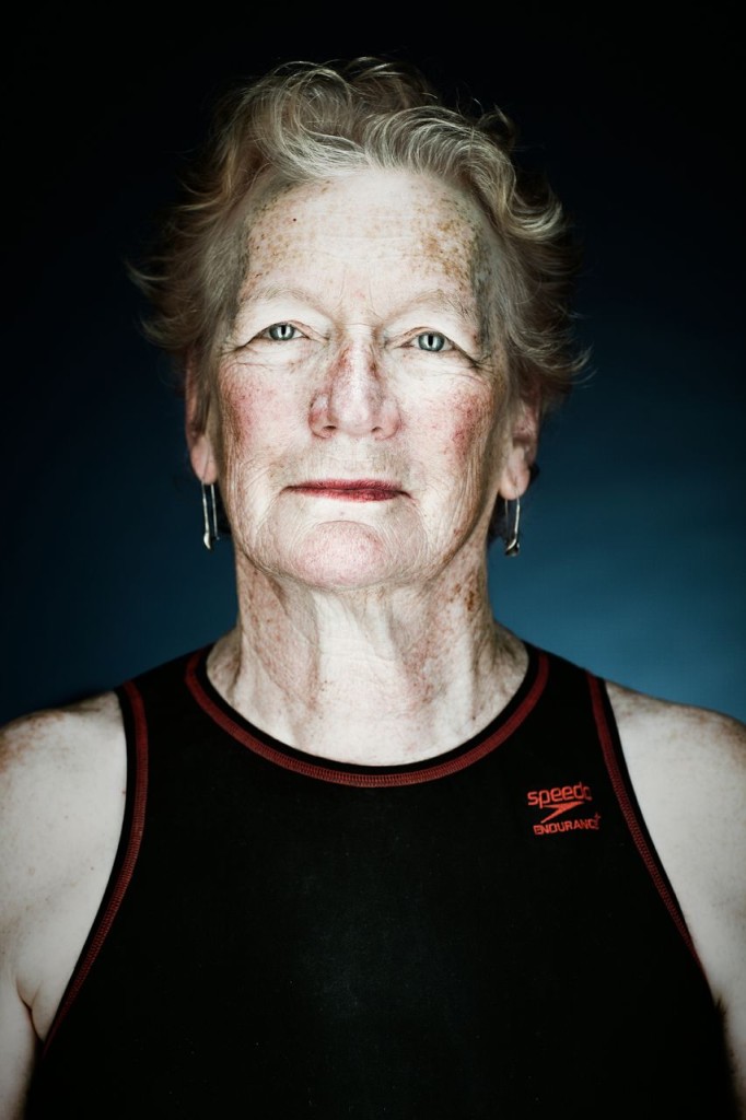 Image of an elegant swimmer with earrings and a Speedo top taken by Vance Jacobs.