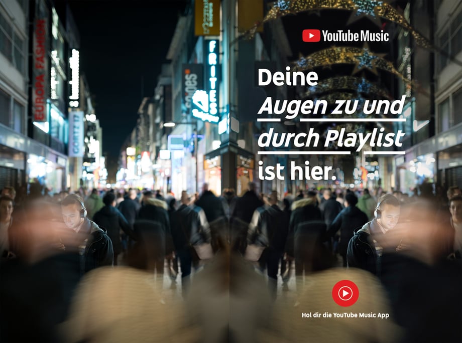 Carsten Behler's photo of people on a busy street at night. Translation: Here is your “close your eyes and [enjoy]” playlist.