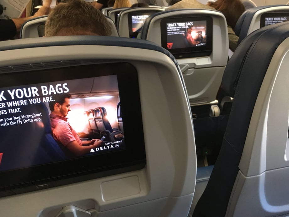 John Fulton's photo shows the in-flight video screens on the back of plane seat headrests