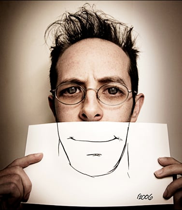 Photograph by Aaron Kotowski of man with a drawn mouth