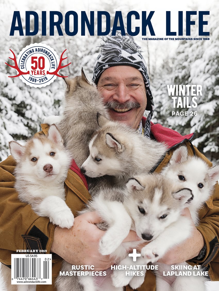 Siberian husky breeder Bob Kreider photographed by Lisa Godfrey for Adirondack Life Magazine