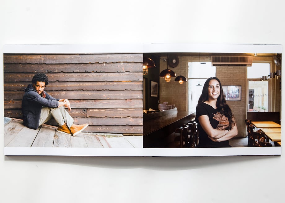 The final print portfolio edit of Adam Lerner's print portfolio open to pages featuring two portraits.