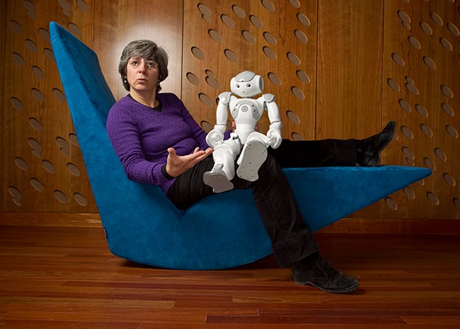 Bill Cramer Photographer / Fast Company Shoot of a woman with a robot in a chair
