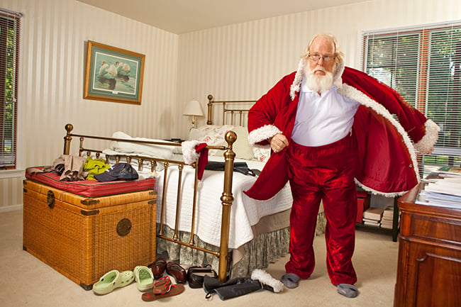 Santa Claus getting dressed