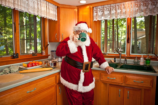 Santa Claus having his morning coffee