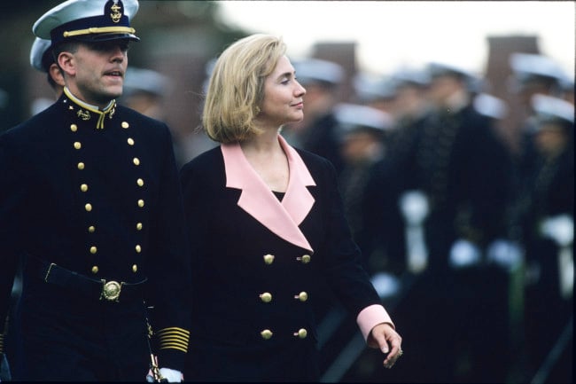 First Lady Hillary Clinton reviews a military troop formation while attending the christening of the USS Columbia submarine in New London, CT.