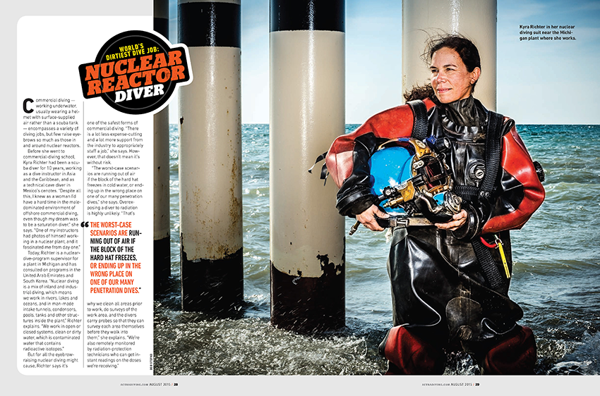Scuba diver Kyra Richter is captured in full scuba gear as she stands knee high in the ocean, by Bob Stefko