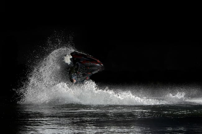 Dom Romney photographed Jack Moule halfway through a 360 degree barrel roll on his jet ski