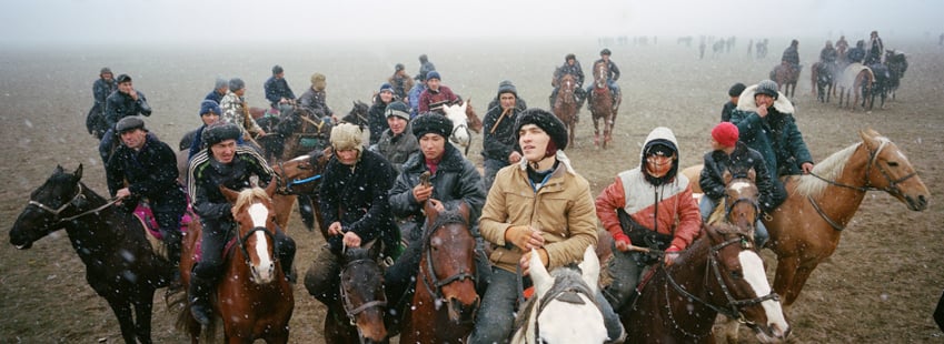 Buzkashi players on horseback by Marc Ressang