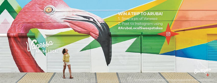Win a trip to aruba ad with Myles McGuinness' photo