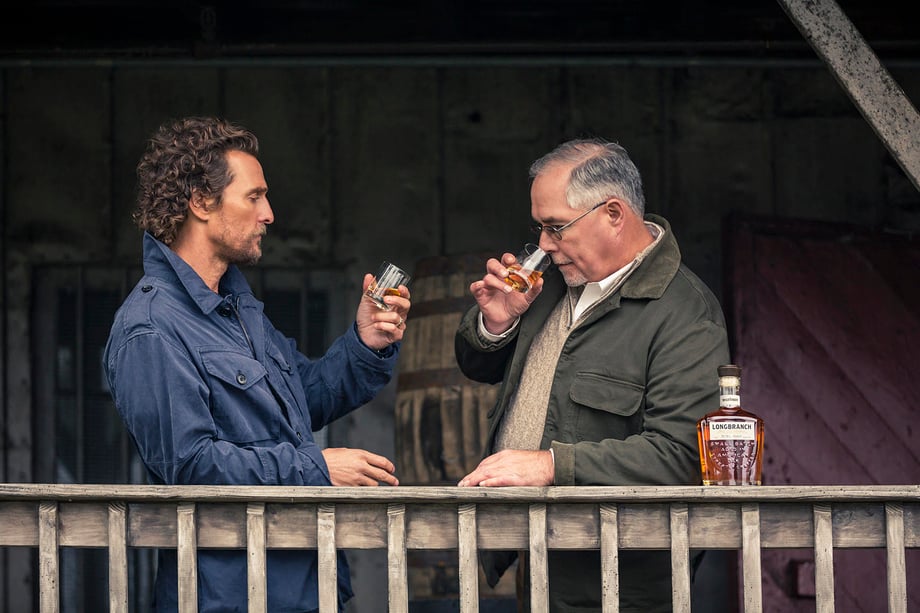 Fernando Decillis photographs Matthew McConaughey and Wild Turkey distiller Eddie Russell sharing a whiskey.