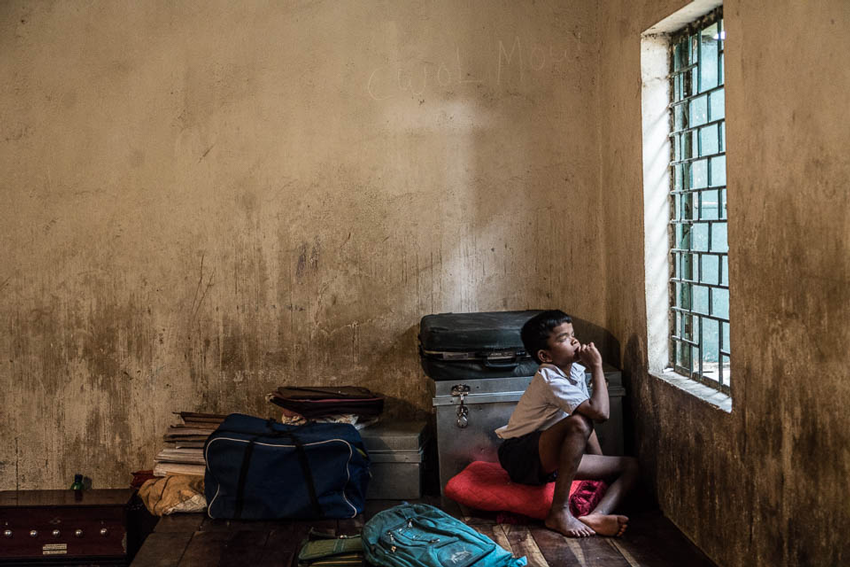 A young blind student sitting by the window, photo by Gary Chapman.