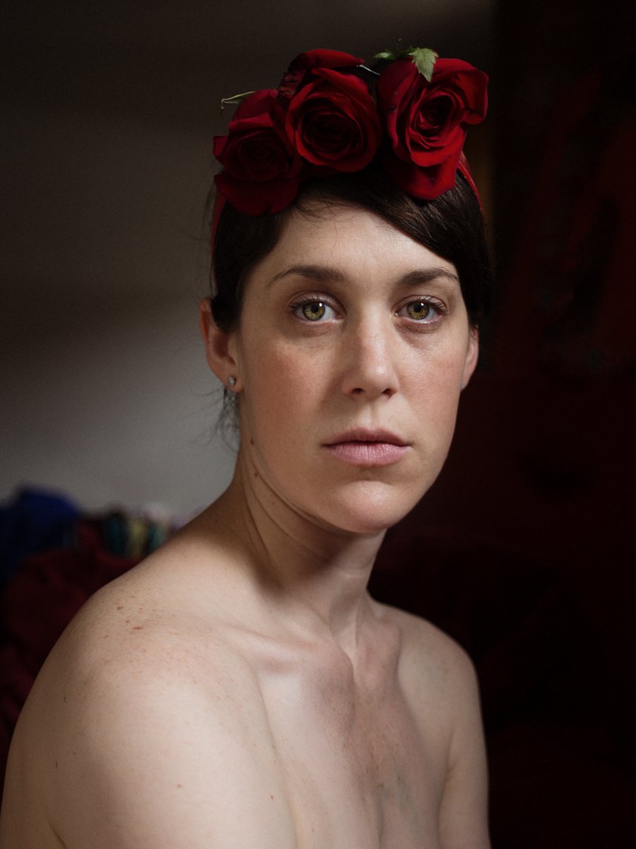 A woman with a headband of roses, photograph by Rachel Hulin