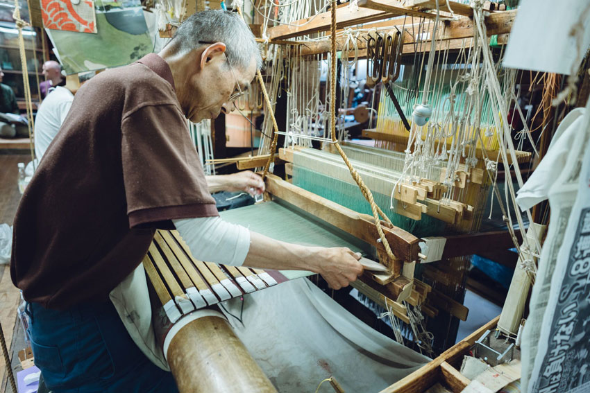 Tokyo photographer Irwin Wong, silk weavers, wonderful machine