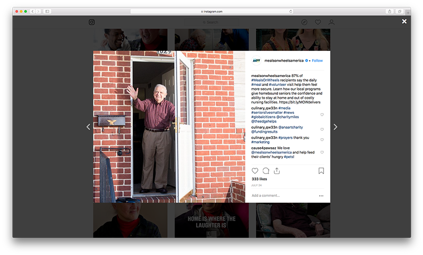Photograph of a man waving from his front door by  Colin Lenton for Meals on Wheels America as featured on their Instagram page.