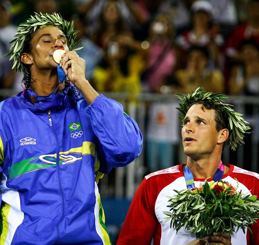 Two athletes with their medals in the Olympics ceremony shot by Jonne Roriz.