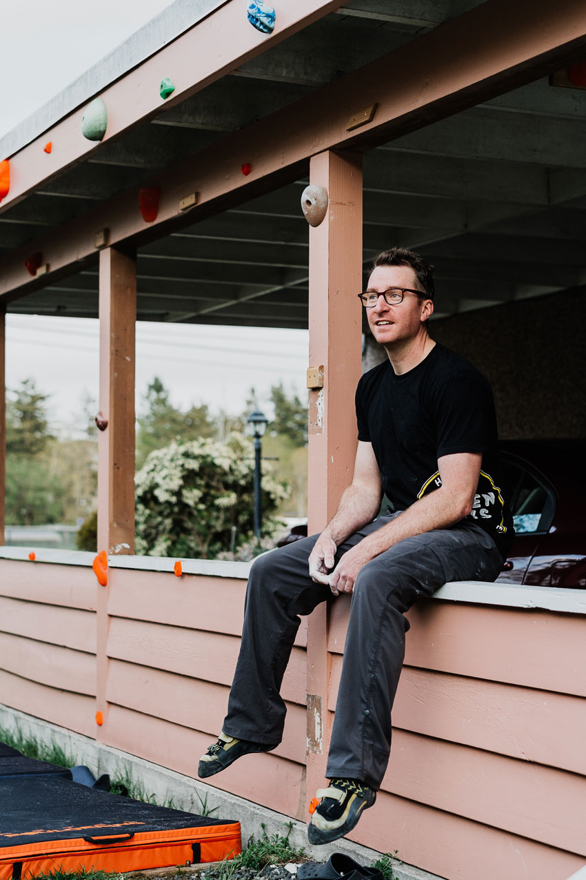 Milen Kootnikoff man sits on porch waiting to climb