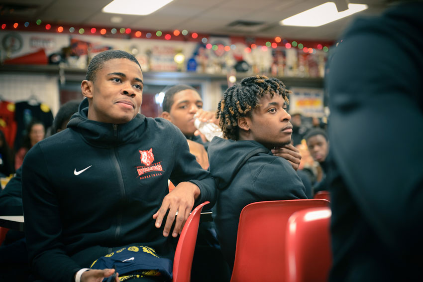 Close up by Mo Daoud of two teen boys at a high school event sponsored by Nike