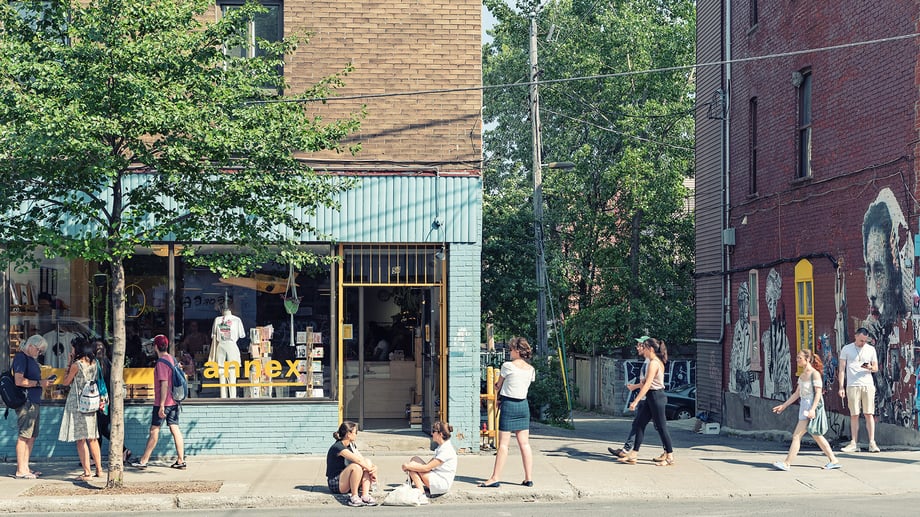 One of David Giral favorite shots captures pedestrians, a storefront, and some murals in Montreal.