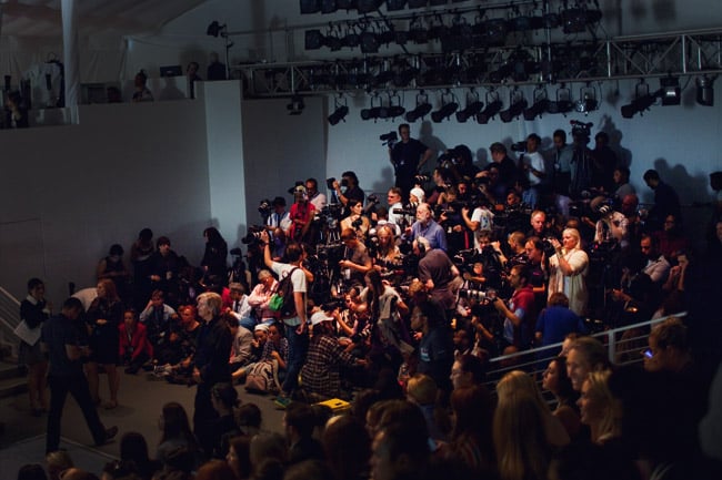The pit of photographers at Fashion Week