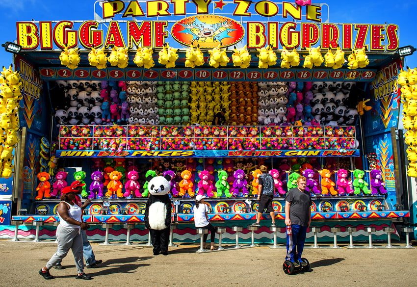 Bryan Regan photo of Sideshow Panda at a carnival plush toy stand
