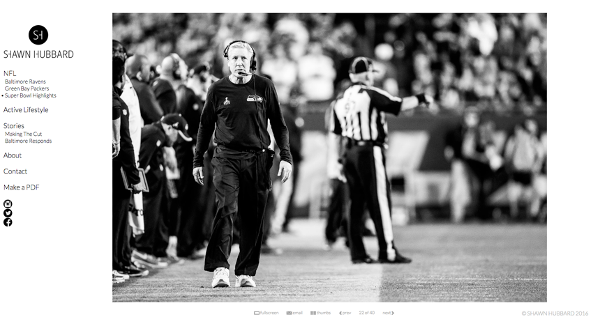 Photo by Shawn Hubbard of a coach on the field as seen on his revamped website.