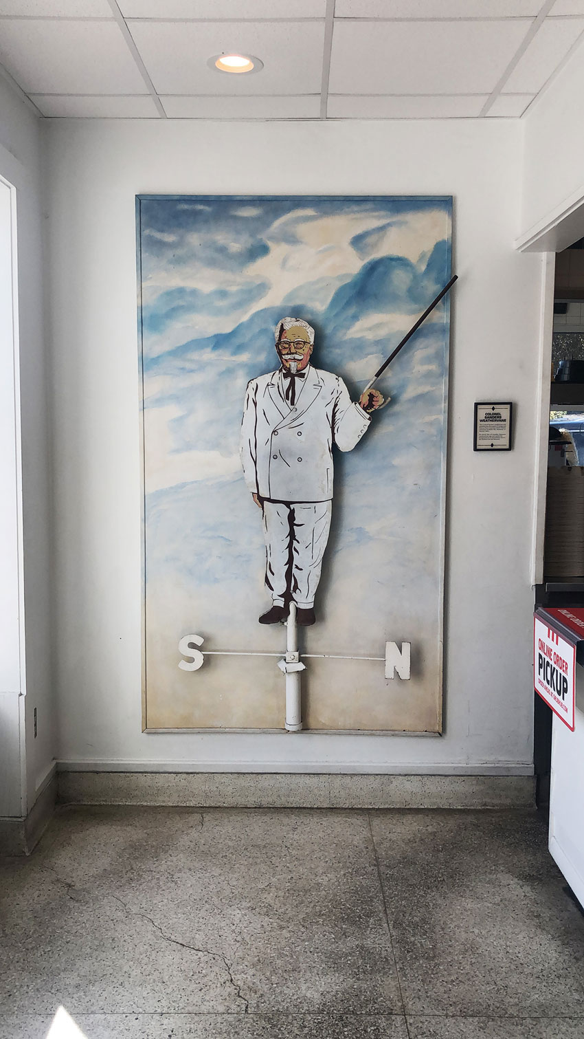 A painting of KFC's Colonel Sanders atop a weathervane shot by Steve Craft for the American Optometric Association