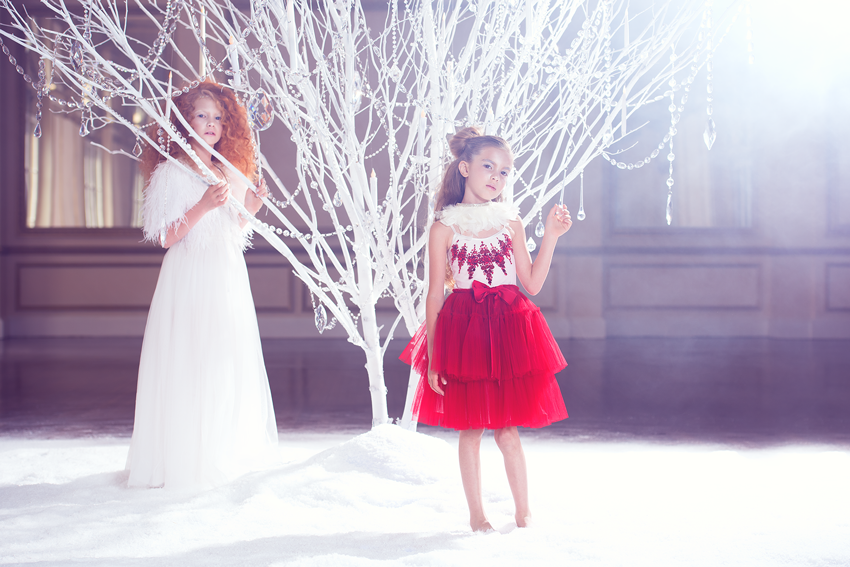 Two girls in an indoor winter wonderland, photograph by Megan Dendinger 