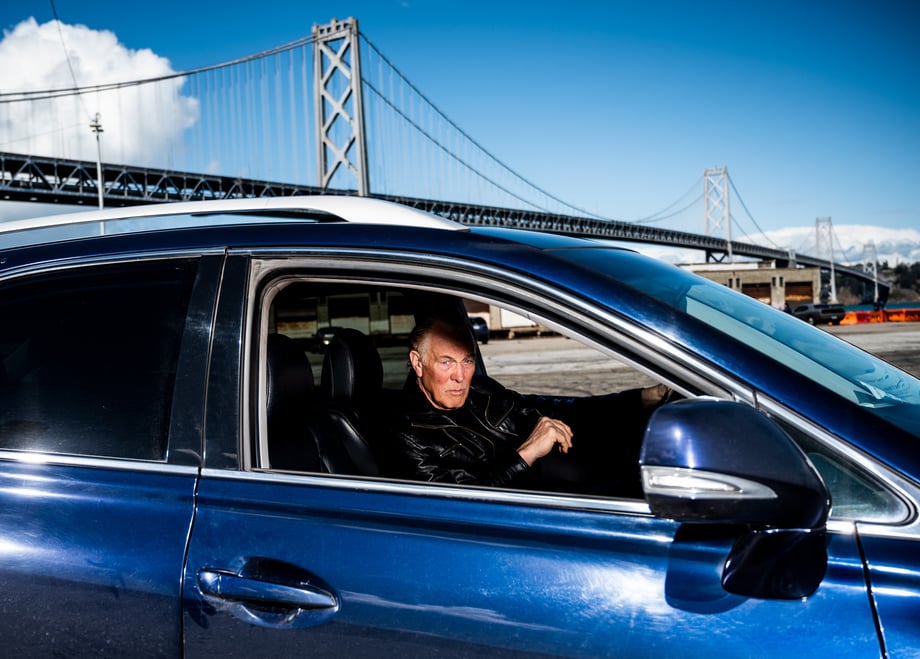 Uber driver Joe in his car at the Bay Area waterfront as shot by Winni Wintermeyer for Der Spiegel