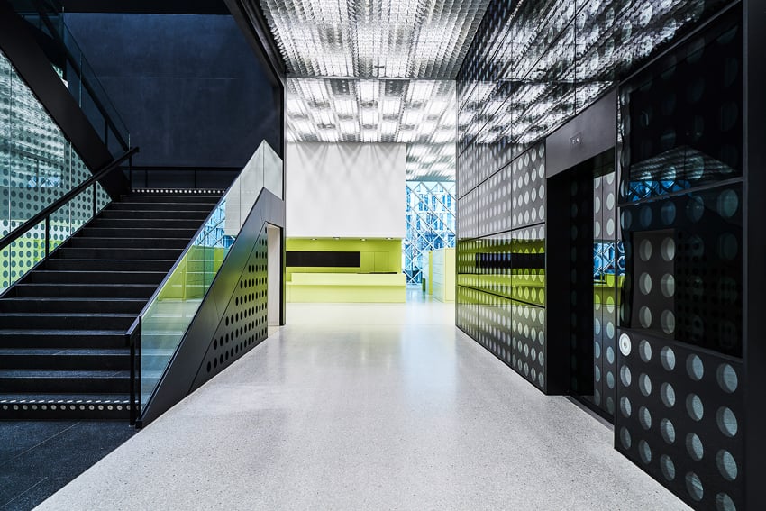 Photo of a hallway with many reflective patterns in The Futurium in Berlin, Germany.