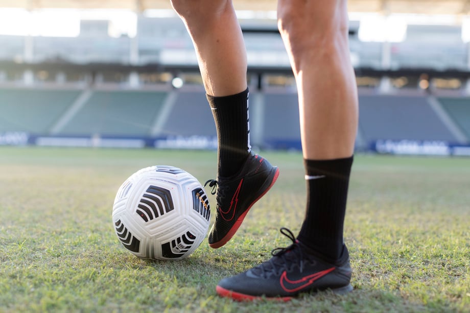 Sabrina Hill photographs Megan Rapinoe dribbling her soccer ball for The Skills