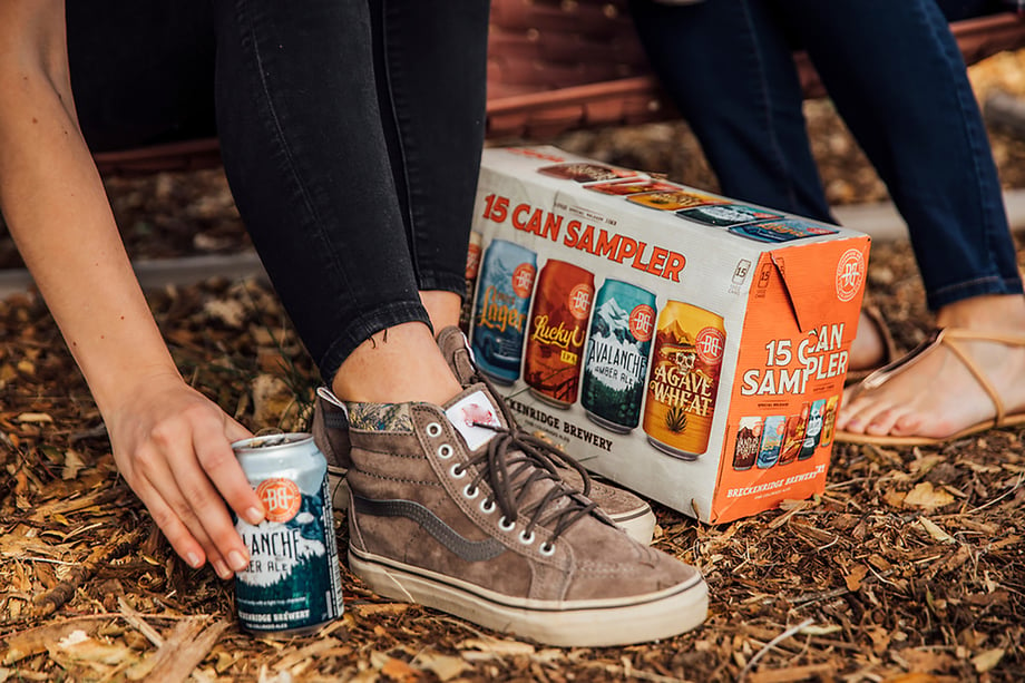 Breckenridge Brewery 15 can sampler pack on wooded ground shot by Jayme Burrows