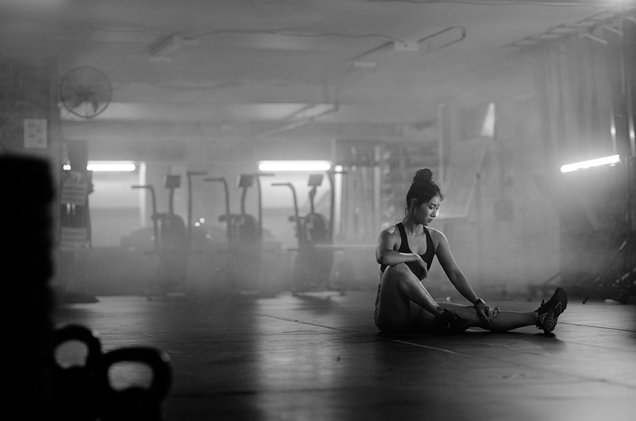 Carrie Xu warms up before her workout. Photographed by Albert Law. 