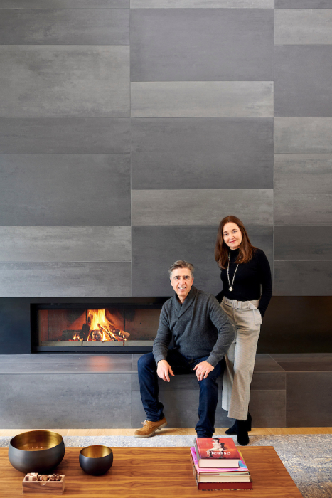 The Molina family in front of living room fireplace built by GSW Architects shot by Bill Purcell for the Wall Street Journal