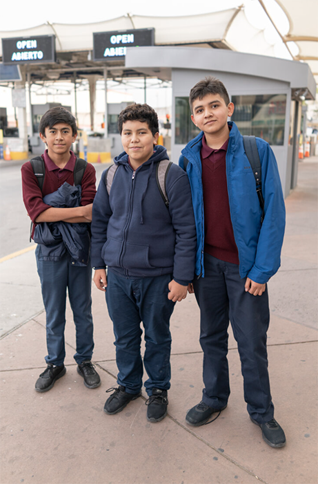 Alexander, Leonardo, and Oscar live in Ciudad Juárez and travel every day to attend school in El Paso, TX. Photography by Bob Rives. 
