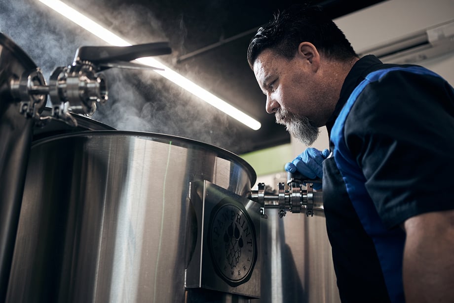 James K. brewing a batch of beer. Photographed by CJ Foeckler for Spike Brewing. 