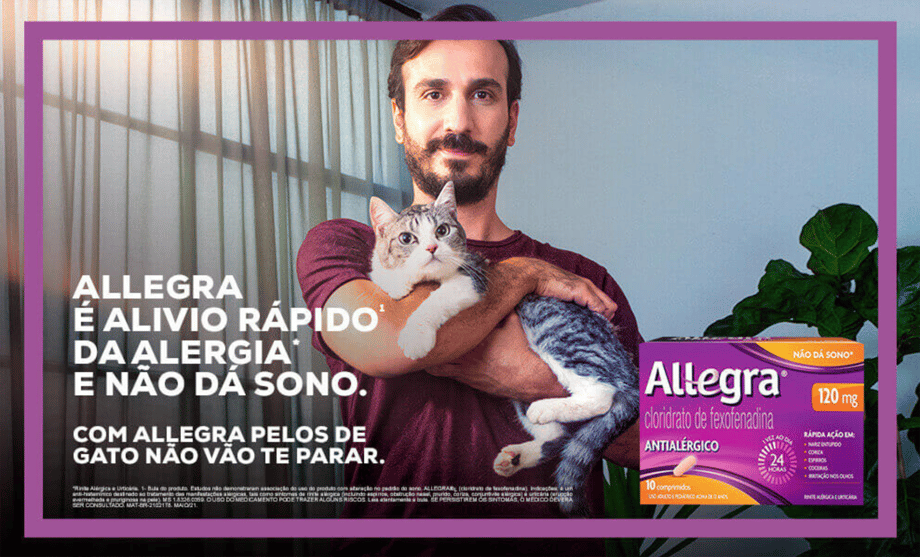 Tear sheet of man holding cat for Allegra campaign shot by Claus Lehmann