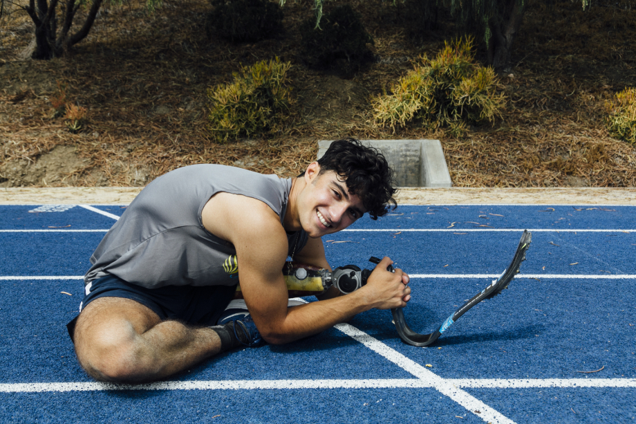 Portrait of Ezra French stretching shot by Emily Malan for Teen Vogue
