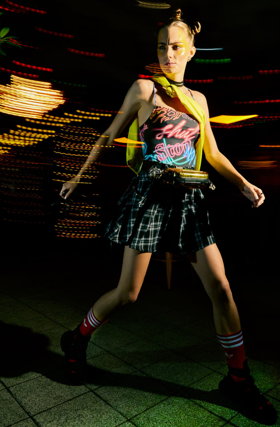 Model Reka Fedra with light trails behind shot by Illya Ovchar for Glamour Hungary