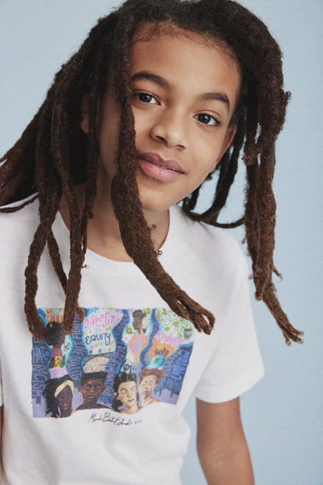 Close up of young kid wearing the collaborative t-shirt. Photographed by Janelle Bendycki for Abercrombie Kids. 