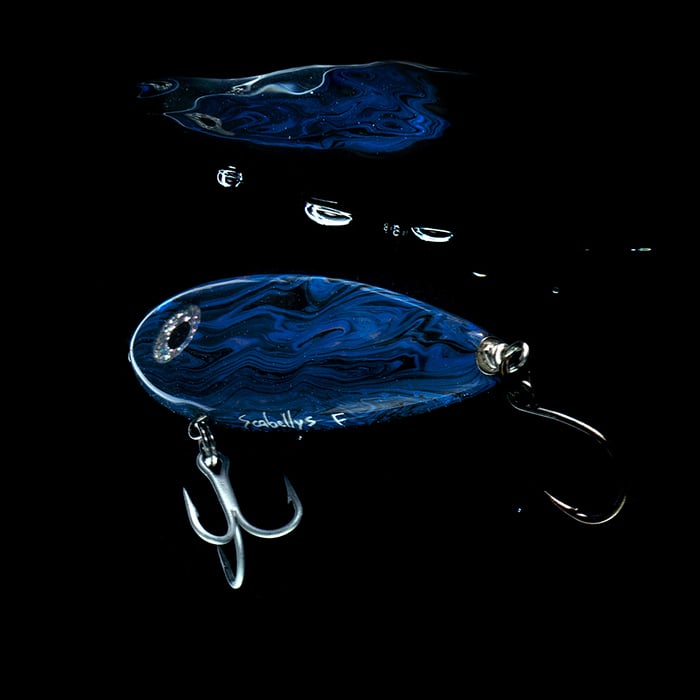 A blue fishing lure photographed by John Kuczala.