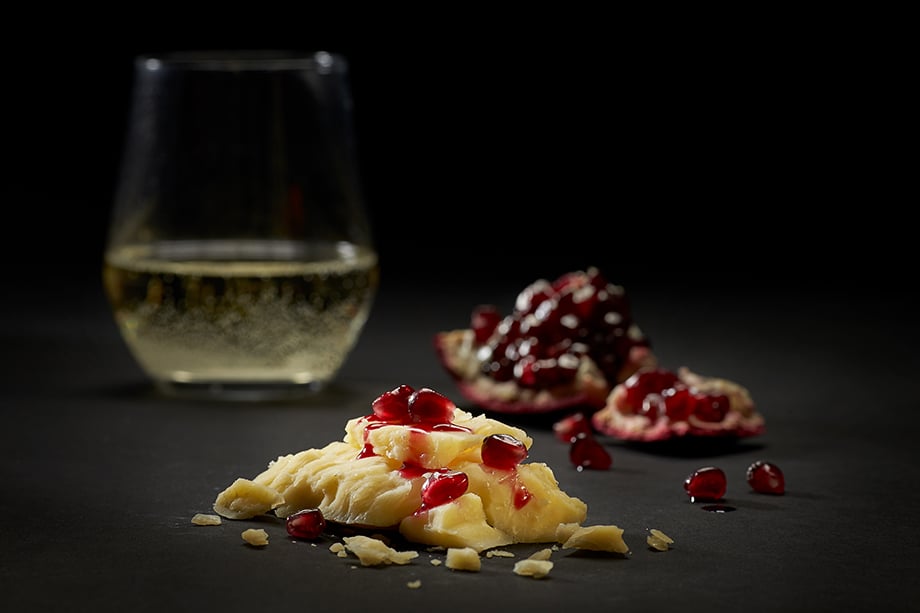 Close up of cheese pairing with wine. Photographed by John Valls for Tillamook Creamery.