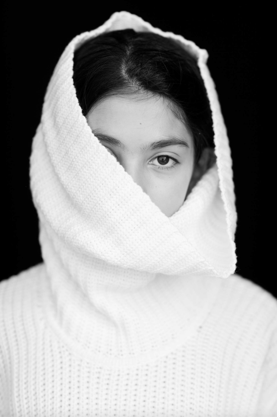 Image of a young girl in black and white photographed by Margo Moritz