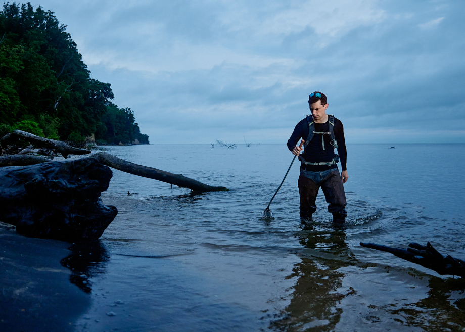 Fossil hunter searching on the coast for Matthew Rakola's personal series My Former Future Self
