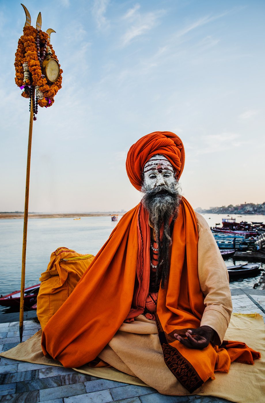 Praying man at Hindu temple on the Ganges in Varanasi shot by Michael Marquand for Lodestars Anthology