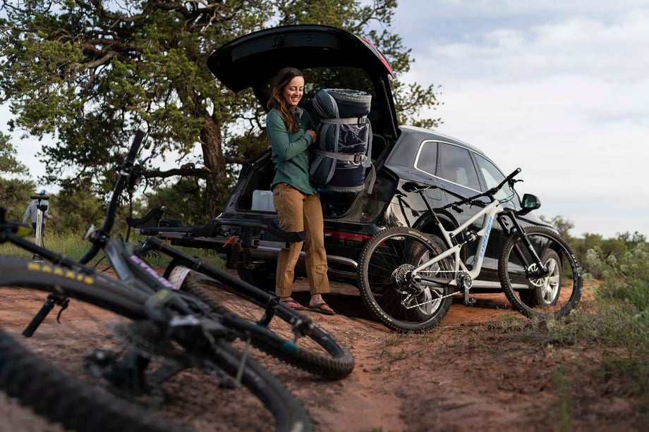 Woman on mountain biking trip in Moab desert removes bundled Hest mattress from car shot by Motofish
