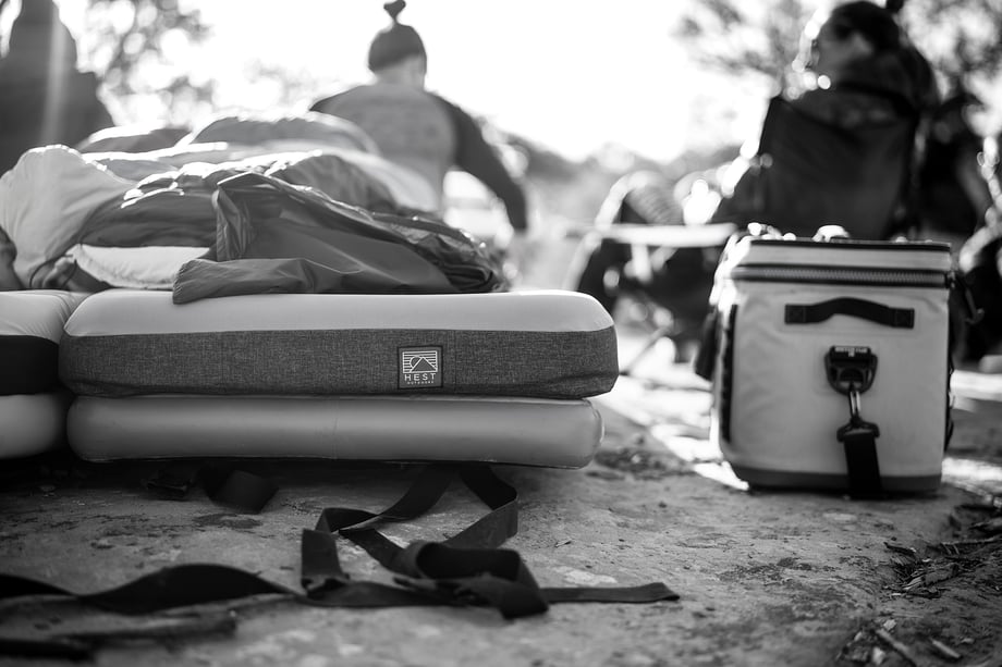 Black and white images of Hest mattress atop a rocky terrain in the Moab desert shot by Motofish