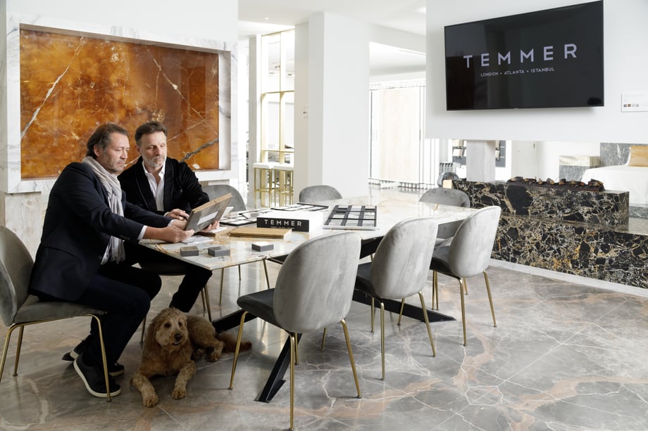 Patrick Heagney photographs two sophisticated designers and their dog surrounded by Temmer Marble
