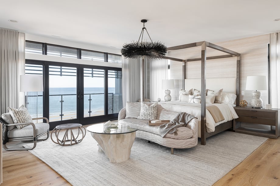 Bedroom with oceanside view in Virginia Beach home designed by Kenneth Byrd.