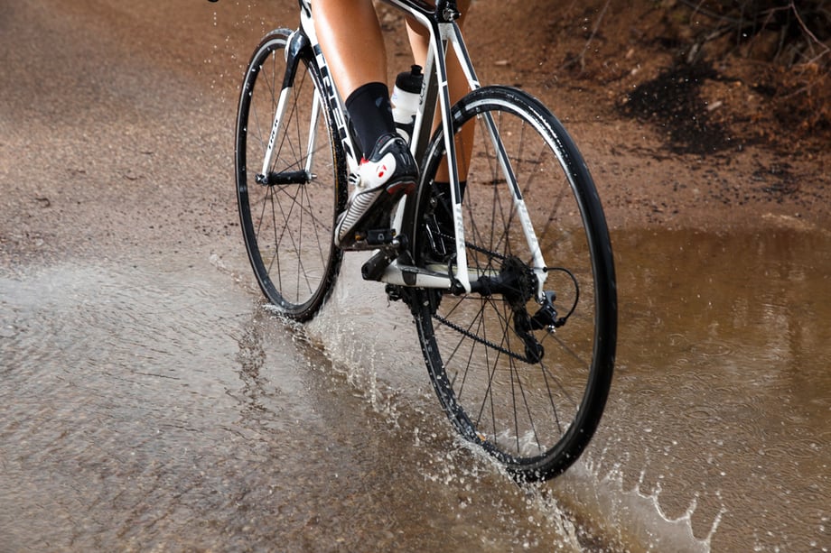 Arizona-based commercial editorial photographer Chris Hinkle shot cyclists in the midst of downpours over mountainous terrain for Bicycling Magazine.